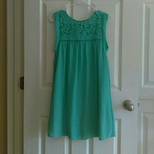 Light turquoise cocktail party dress.
